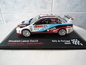 1:43 Altaya Mitsubishi Lancer Evo IX 2009 White W/Blue,Red & Black Stripes. Uploaded by indexqwest